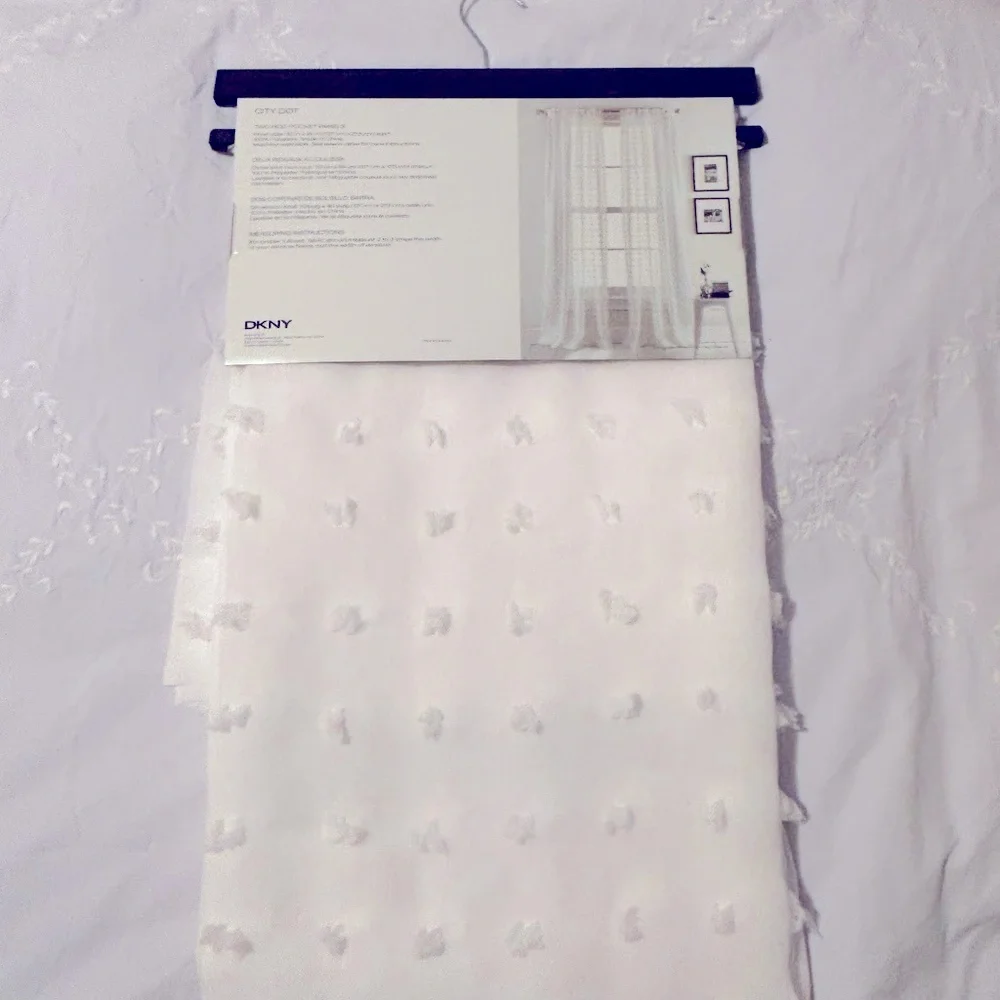 DKNY White sheer Curtain Panel Swiss dot.   2 panels 50in x  84in